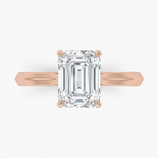 IGI Certified 1.75 ct Emerald Cut Natural Diamond Knife Edge Solitaire Ring in 14K Rose Gold: This distinguished 1.75 carat natural emerald-cut diamond ring is beautifully crafted in 14K Rose Gold, offering exceptional brilliance and enduring appeal. This design highlights the beauty of the ce