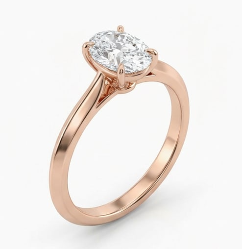 IGI Certified 1.6 ct Oval Cut Natural Diamond Knife Edge Solitaire Ring in 14K Rose Gold: An elegant 1.6 carat natural oval-cut diamond ring, finely made in 14K Rose Gold with a refined profile and auction-worthy presentation. This design highlights the beauty of the center stone alone, of