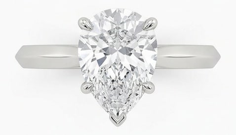 GIA Certified 1.35 ct Pear Cut Natural Diamond Knife Edge Solitaire Ring in 14K White Gold: An exceptional 1.35 carat natural pear-cut diamond ring, masterfully crafted in luxurious 14K White Gold and designed to embody refined elegance and lasting beauty. This design highlights the beauty o