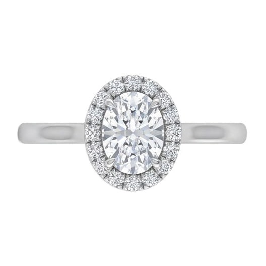 GIA Certified 1.5 ct Oval Cut Natural Diamond Rosette Halo Ring in 14K White Gold: This distinguished 1.5 carat natural oval-cut diamond ring is beautifully crafted in 14K White Gold, offering exceptional brilliance and enduring appeal. This design is enhanced with matching diamond 