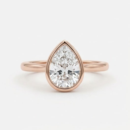 GIA Certified 1.7 ct Pear Cut Natural Diamond Refined Solitaire Ring in 14K Rose Gold: An exceptional 1.7 carat natural pear-cut diamond ring, masterfully crafted in luxurious 14K Rose Gold and designed to embody refined elegance and lasting beauty. This design highlights the beauty of 