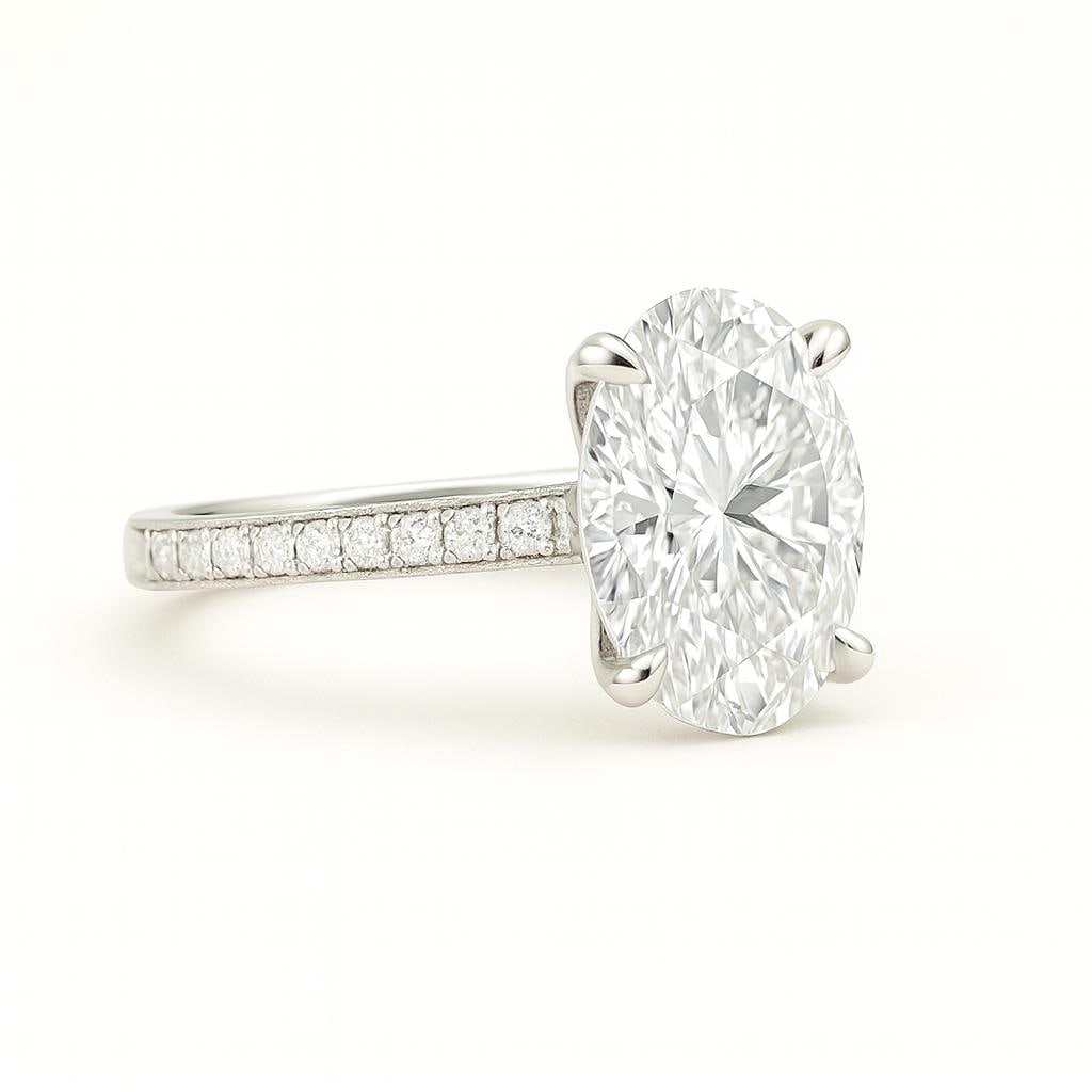 3.50 CT Lab Grown Oval Cut Diamond Solitaire Ring with Pavé Band in 14K White Gold: Elegant 3.50 carat lab grown oval cut diamond solitaire, set in a secure prong setting. The pavé-set diamond band in 14K white gold adds extra brilliance and timeless charm, making this a perfect sym