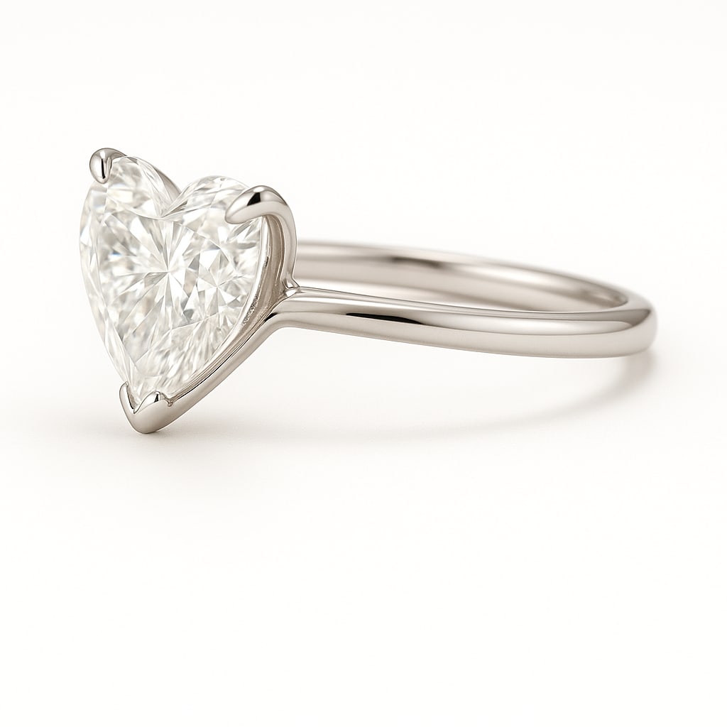 5.00 CT Lab Grown Heart Cut Diamond Solitaire Ring in 14K White Gold: Romantic 5.00 carat lab grown heart cut diamond solitaire, prong set on a polished 14K white gold band. A timeless solitaire ring that symbolizes love and brilliance.Color Grade: D–FClarity: VVS1–