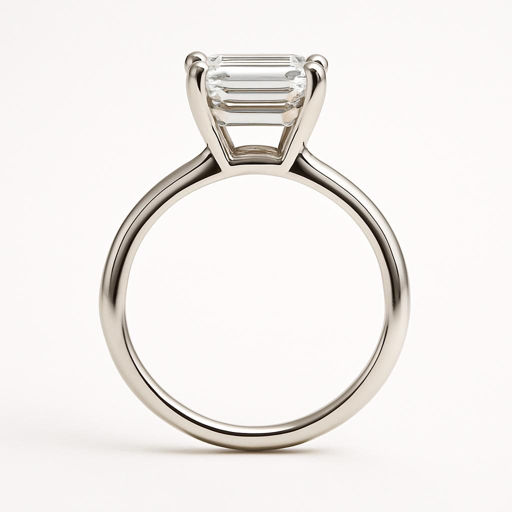 5.00 CT Lab Grown Emerald Cut Diamond Solitaire Ring in 14K White Gold: Sophisticated 5.00 carat lab grown emerald cut diamond, prong set on a polished 14K white gold band. A timeless solitaire engagement ring that emphasizes the clean lines and step-cut brilliance of the