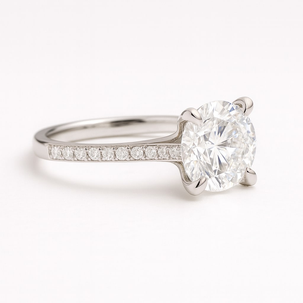 4.00 CT Lab Grown Round Brilliant Diamond Solitaire Ring with Pavé Band in 14K White Gold: Stunning 4.00 carat lab grown round brilliant diamond solitaire, prong set on a polished 14K white gold band adorned with pavé-set diamonds. A modern and elegant design that enhances brilliance and s