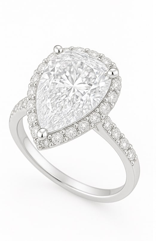 10.00 CT Pear Cut Lab Grown Diamond Halo Ring with Pavé Band in 14K White Gold: A magnificent 10.00 carat pear cut lab grown diamond dazzles at the center, encircled by a shimmering halo of round diamonds. The pavé-set diamond band adds brilliance and sparkle from every angle, w