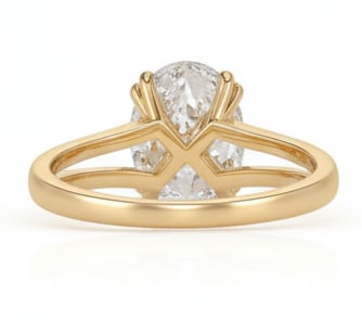 7.00 CT Oval lab-grown diamond Diamond Split-Shank Engagement Ring in 14K Yellow Gold: This luxurious engagement ring features a 7.00 carat oval lab-grown diamond diamond set in a graceful split-shank design crafted from solid 14K yellow gold. The split band is pav?-set with shimmering 
