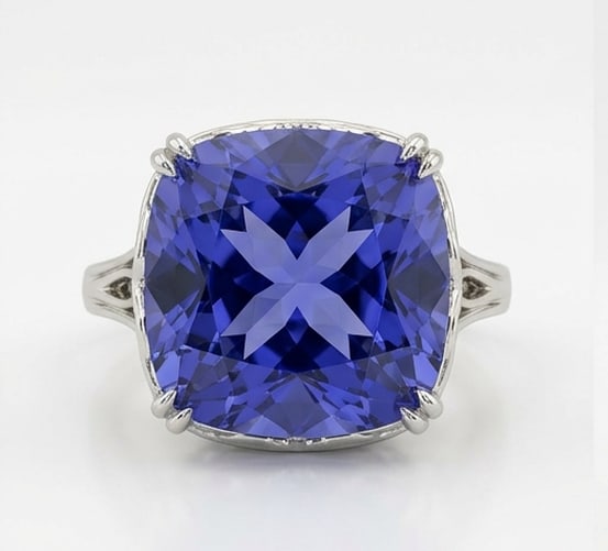 4.0 Ct Cushion Natural Tanzanite 14K White Gold Solitaire with Split Shank Detail Ring - Certified: This certified fine jewelry piece features a 4.0 carat natural Tanzanite in a Cushion cut, crafted in 14K White Gold. The Solitaire with Split Shank Detail design highlights the beauty of the natural 