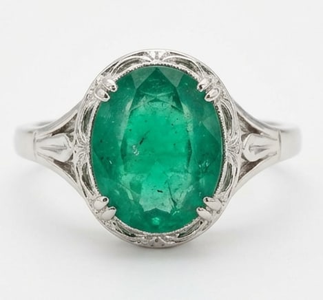 3.5 Ct Oval Natural Emerald 14K White Gold Vintage Solitaire with Engraving Ring - Certified: This certified fine jewelry piece features a 3.5 carat natural Emerald in a Oval cut, crafted in 14K White Gold. The Vintage Solitaire with Engraving design highlights the beauty of the natural center