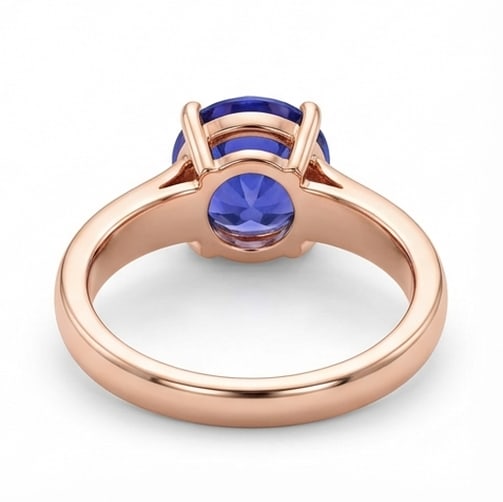 2.5 Ct Round Natural Tanzanite 14K Rose Gold Solitaire Setting Ring - Certified: This certified fine jewelry piece features a 2.5 carat natural Tanzanite in a Round cut, crafted in 14K Rose Gold. The Solitaire Setting design highlights the beauty of the natural center stone. All c
