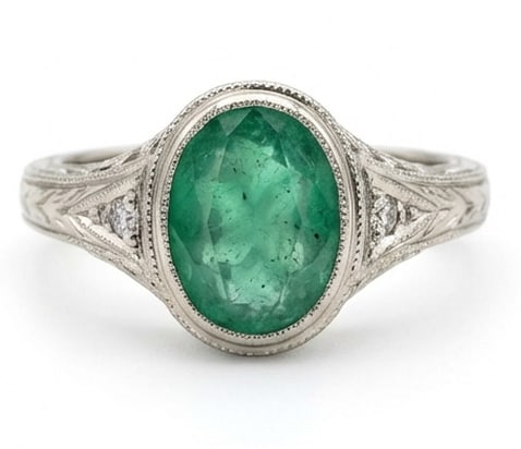 3.5 Ct Oval Natural Emerald 14K White Gold Vintage Solitaire with Engraving Ring - Certified: This certified fine jewelry piece features a 3.5 carat natural Emerald in a Oval cut, crafted in 14K White Gold. The Vintage Solitaire with Engraving design highlights the beauty of the natural center