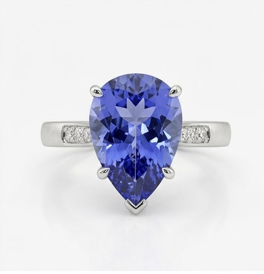 4.0 Ct Pear Natural Tanzanite 14K White Gold Solitaire with Inset Pave Accents Ring - Certified: This certified fine jewelry piece features a 4.0 carat natural Tanzanite in a Pear cut, crafted in 14K White Gold. The Solitaire with Inset Pave Accents design highlights the beauty of the natural cen