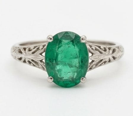 2.5 Ct Oval Natural Emerald 14K White Gold Vintage Solitaire with Filigree Ring - Certified: This certified fine jewelry piece features a 2.5 carat natural Emerald in a Oval cut, crafted in 14K White Gold. The Vintage Solitaire with Filigree design highlights the beauty of the natural center 
