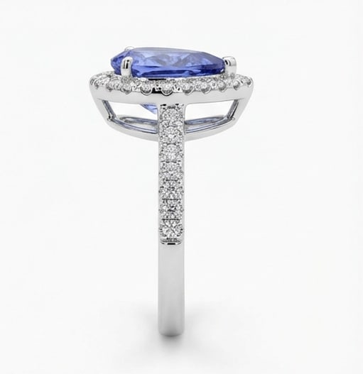 2.5 Ct Pear Natural Tanzanite 14K White Gold Halo Setting with Pave Shank Ring - Certified: This certified fine jewelry piece features a 2.5 carat natural Tanzanite in a Pear cut, crafted in 14K White Gold. The Halo Setting with Pave Shank design highlights the beauty of the natural center s