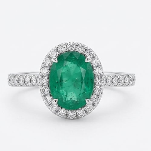 3.0 Ct Oval Natural Emerald 14K White Gold Halo Setting with Pave Shank Ring - Certified: This certified fine jewelry piece features a 3.0 carat natural Emerald in a Oval cut, crafted in 14K White Gold. The Halo Setting with Pave Shank design highlights the beauty of the natural center sto