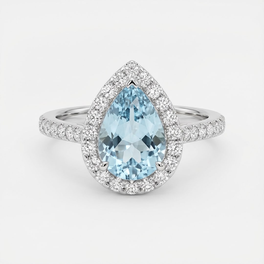 2.0 Ct Pear Natural Aquamarine 14K White Gold Halo Setting with Pave Shank Ring - Certified: This certified fine jewelry piece features a 2.0 carat natural Aquamarine in a Pear cut, crafted in 14K White Gold. The Halo Setting with Pave Shank design highlights the beauty of the natural center 