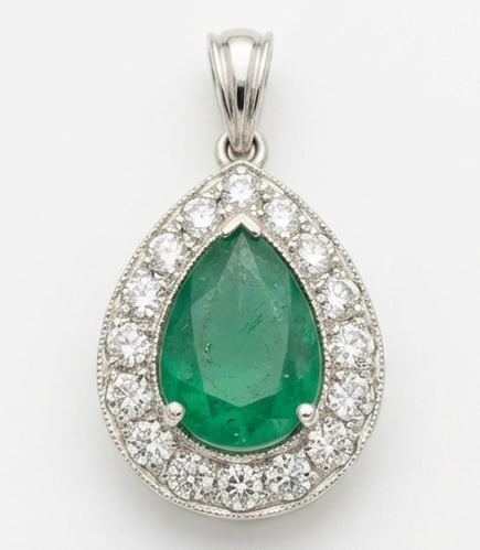 2.0 Ct Pear Natural Emerald 14K White Gold Halo Pendant - Certified: This certified fine jewelry piece features a 2.0 carat natural Emerald in a Pear cut, crafted in 14K White Gold. The Halo Pendant design highlights the beauty of the natural center stone. It is accent