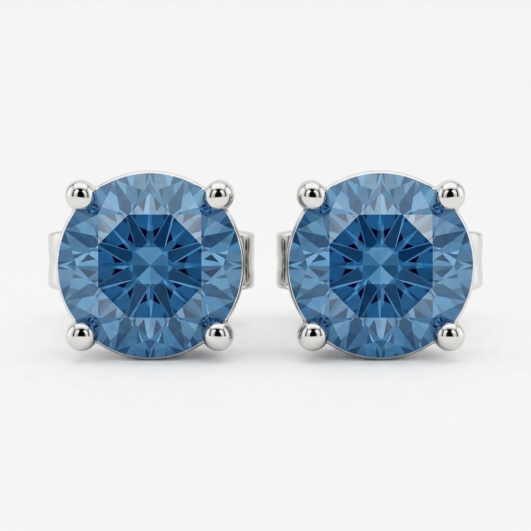 Platinum 4 Carat Total Weight Round Cut Fancy Blue Lab-Grown Diamond Stud Earrings: An elegant pair of platinum stud earrings featuring certified round brilliant-cut fancy blue lab-grown diamonds totaling 4 carats (2 carats each). Each vibrant blue stone is held securely in a classic