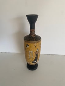 An Ancient Greek Vase, Specifically A Type Known As A Lekythos.
