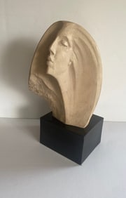This Sculpture Depicts A Stylized Female Bust In A Contemplative Or Dream-like Pose.