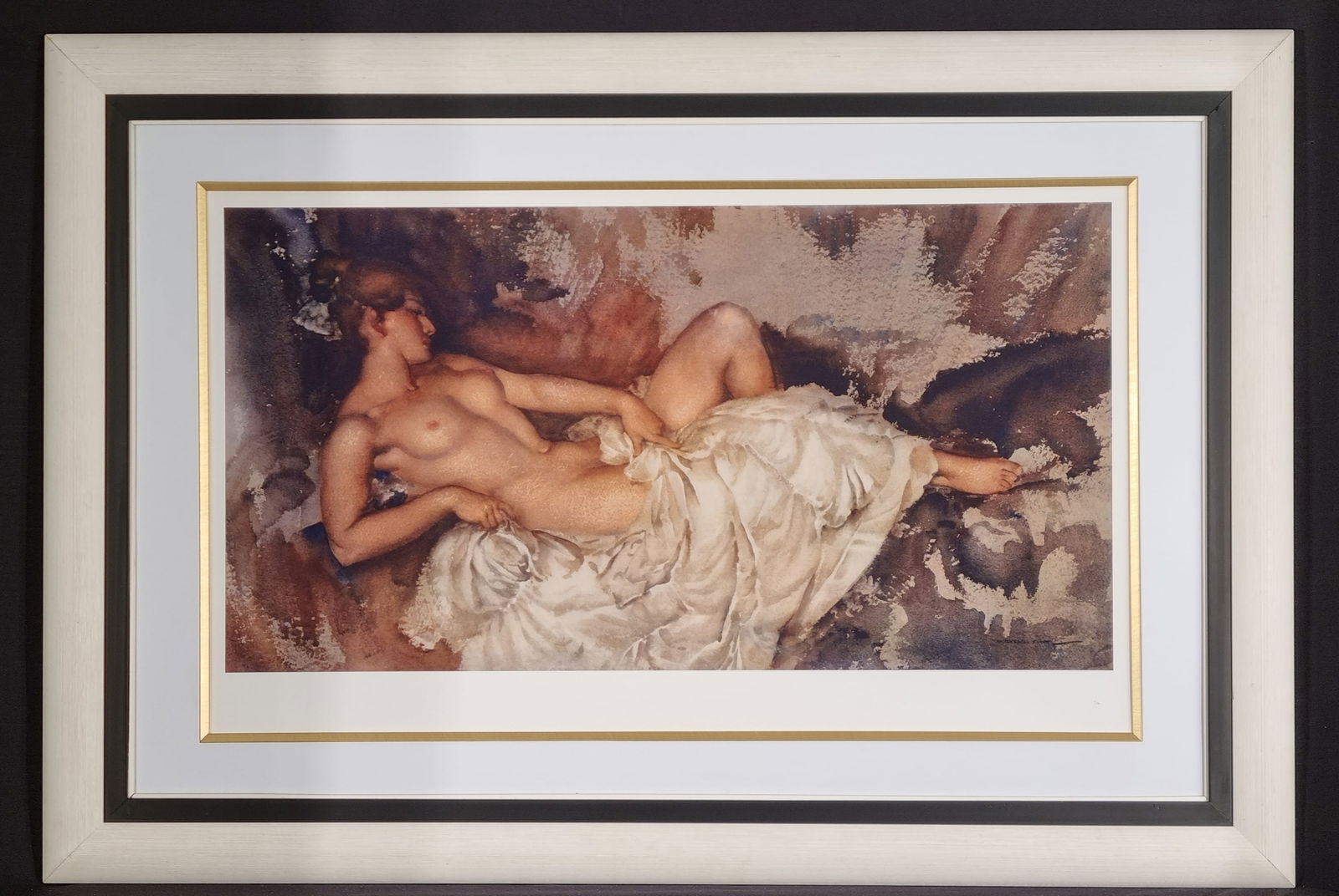 Russell Flint Limited Edition "Reclining Nude" with Rare Book: A beautifully framed limited edition titled "Reclining Nude" by the great artist Sir William Russell Flint. This piece is one of only 99 ever published worldwide. This lot will include a rare limited