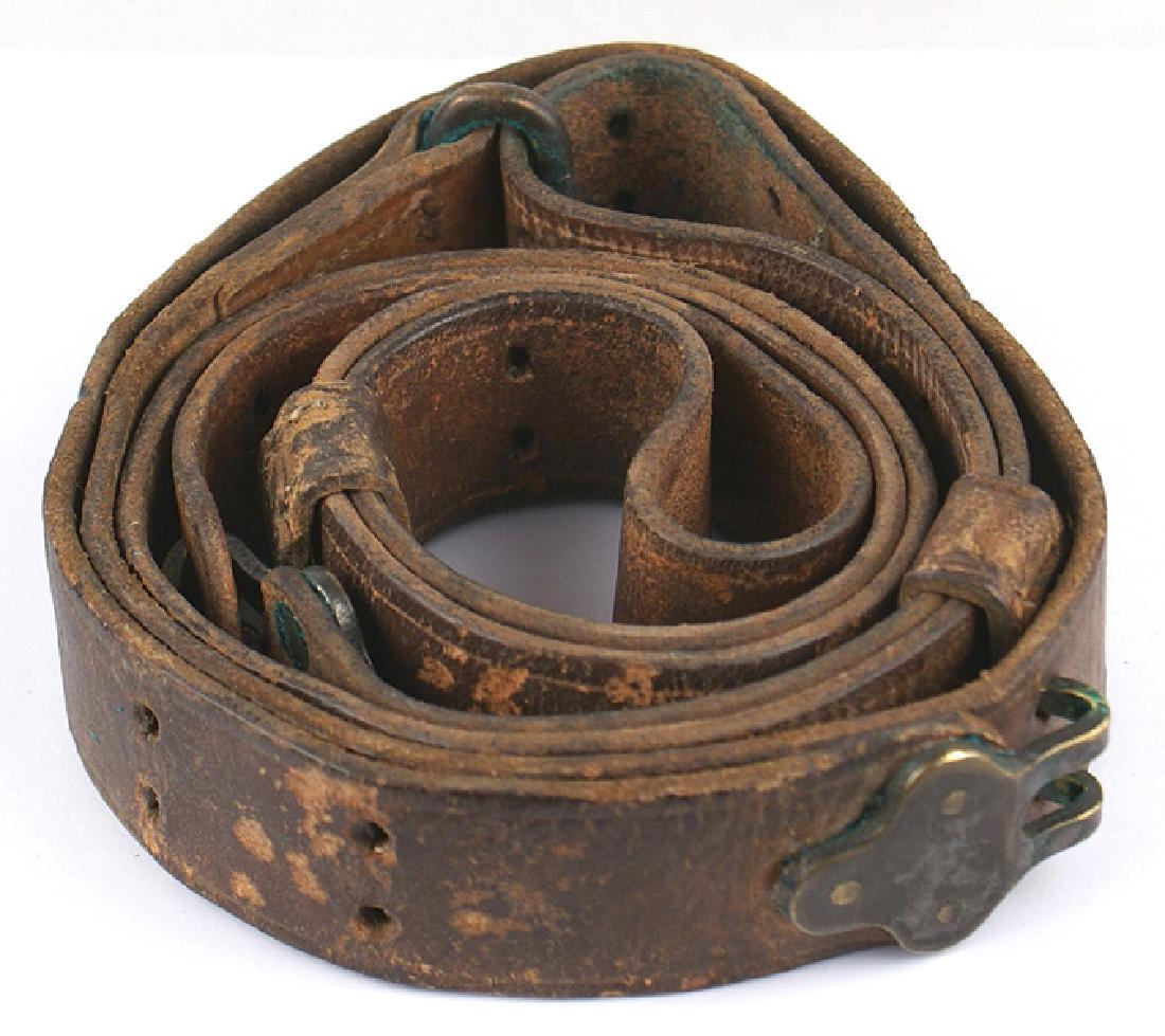 U.S. M1907 rifle sling 1903 Springfield M-1: M-022 U.S. M1907 brown leather rifle sling. Used for the 1903 Springfield, M1917 Enfield and the M-1 Garand. Shows some wear, but is still supple. II-