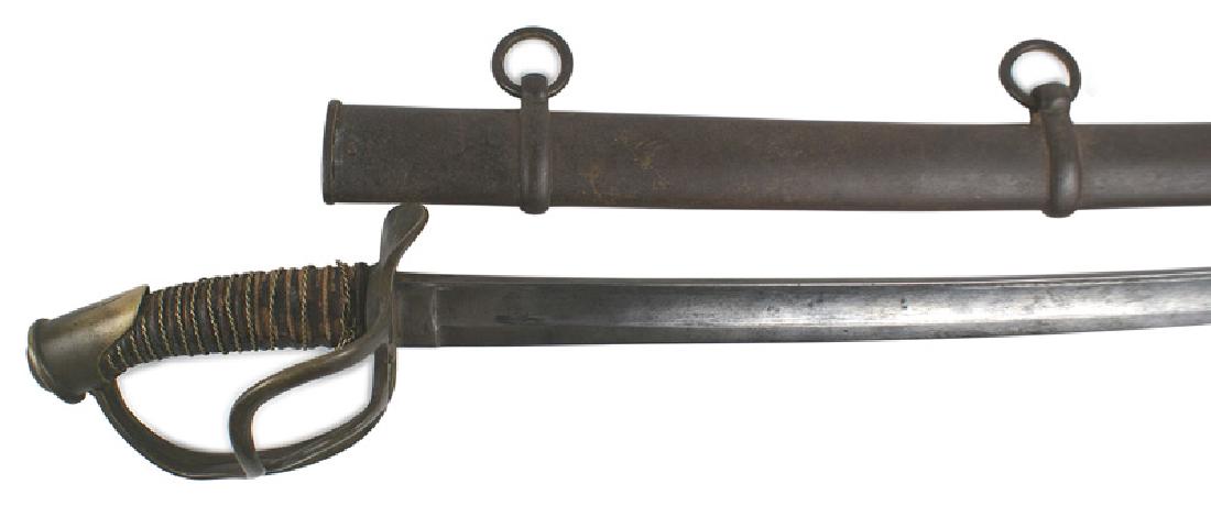 U.S. M1840 wrist breaker sword: K-020 U.S. M1840 "wrist breaker". Brass pommel and three-branch guard. Tip of guard bent. Braided brass wire wrapped leather grip (some leather worn away). 35 1/4" curved graying blade with some dark