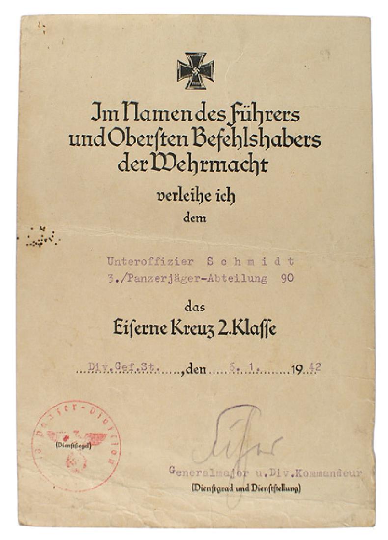 German WWII Award document 1939 Iron Cross: C-004 German WWII Award document for the 1939 Iron Cross 2nd Class. Awarded to an NCO in the 90th Panzerjager-Abteilung on "6.1.1942". Ink stamping of the 10th Panzer Division and pencil signed by the