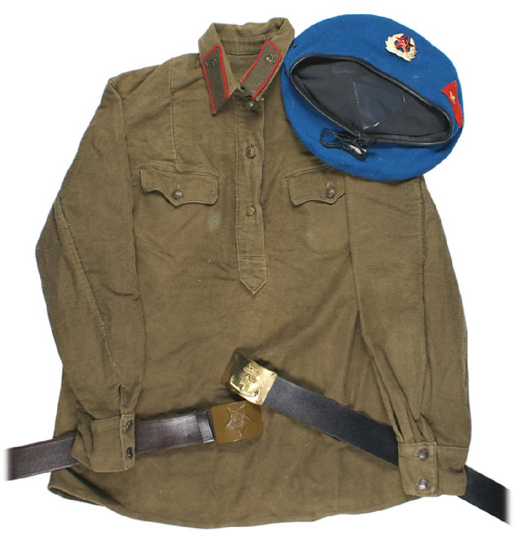 Soviet post-1945 uniform accessories lot: F-103 Lot of Soviet post-1945 uniform accessories: (1) Medical "Gymnastiorka". Winter-type OD wool with two chest pockets. Three hammer and sickle buttons on front, two on pockets and two on each cuff