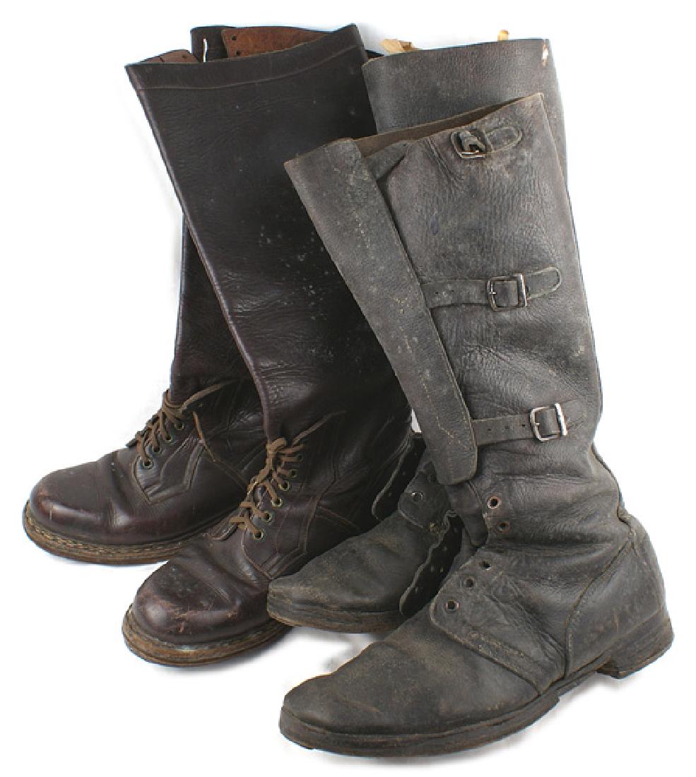 Lot of 2 pairs European military boots: N-099 Lot of 2 unknown pairs of European military boots: (1) Black leather with seven eyelits for tying at the ankle. 16" shafts which wrap around and have three straps/buckles. Steel taps and horsesh