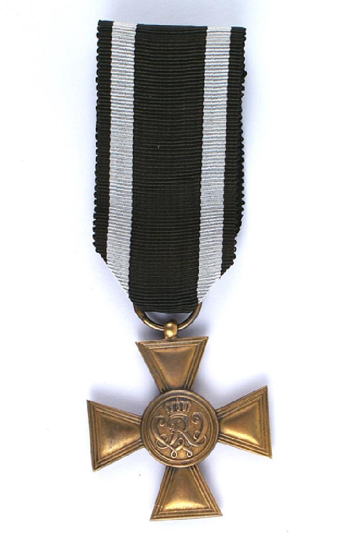 Prussian Military Merit Cross Medal: B-002 Prussian Military Merit Cross. Subdued gilt silver finish with a crowned "RW" cypher in the center. Bottom edge is marked "W" and "835". (Firm of Wilm). Replaced ribbon. This decoration was the 