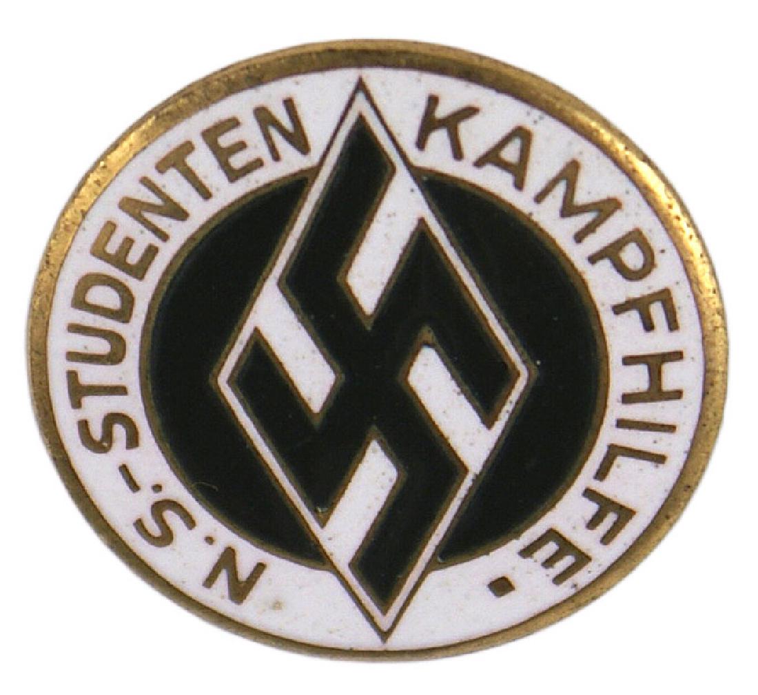 German WWII Studentenbund War Help lapel pin: B-079 German WWII Studentbund War Help Organization enameled lapel pin Elongated swastika on a diamond with gilt letter name of this group. Reverse marked "RZM M1/63". II