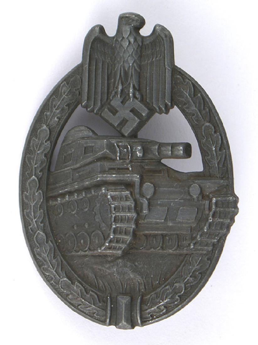German WWII Panzer Badge Silver: B-121 German WWII Panzer Badge - Silver. Solid type with a dark patina. Reverse is maker marked "SA" within a triangle. II