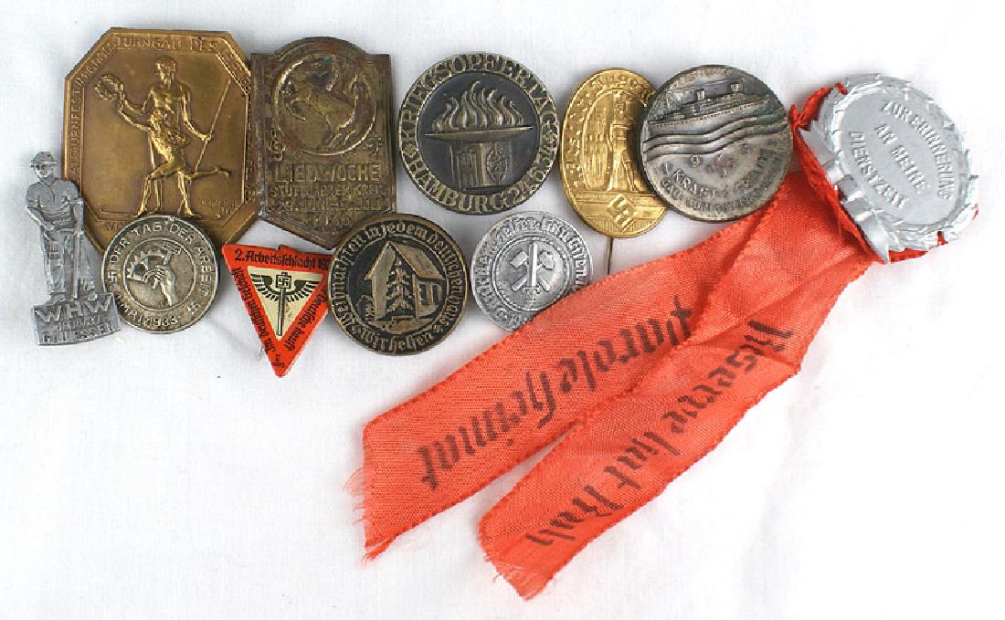 Lot of 11 German WWII tinnies HJ KDF NSKOV: B-133 Lot of 11 German WWII "tinnies". Includes a Large 1927 Leipzig Sports Competition, 1933 HJ Meet, 1933 Worker's Day, 1934 KDF, 1934 NSKOV Day of Offering and a 1935-36 Gau Essen Appreciation Rall