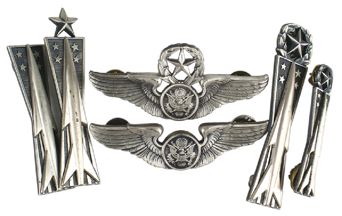 Post WWII U.S. Air Force STERLING Badges: B-212 Lot of 6 post-WWII U.S. Air Force "STERLING" badges. All are clutch-back, marked "STERLING" with name of maker. Includes Air Crew Member, Chief Air Crew Member, Missleman, Senior Missleman and M