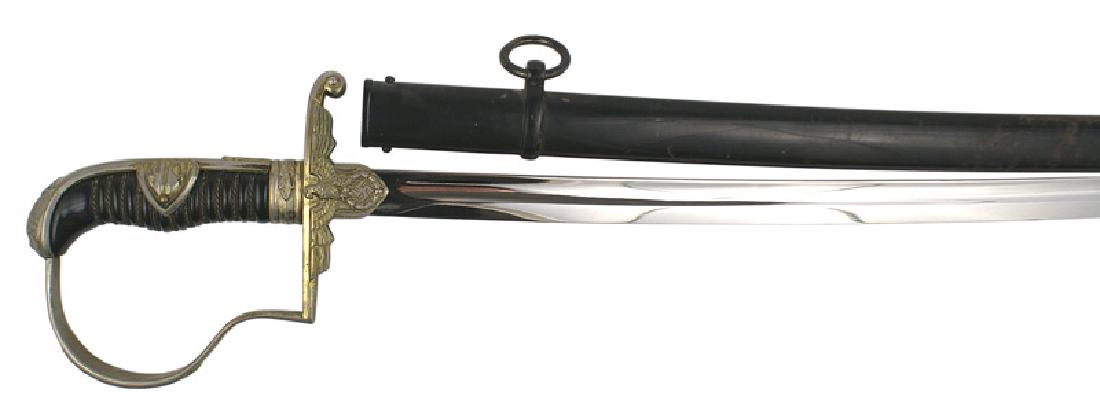 German WWII Prinz Eugen model sword: D-069 German WWII "Prinz Eugen" model dress sword. Favored by Waffen-SS officers, this sword bears a single backstrap, eagle/swastika pommel and relief oak leaves. Similar leaves on the reverse "P" kn