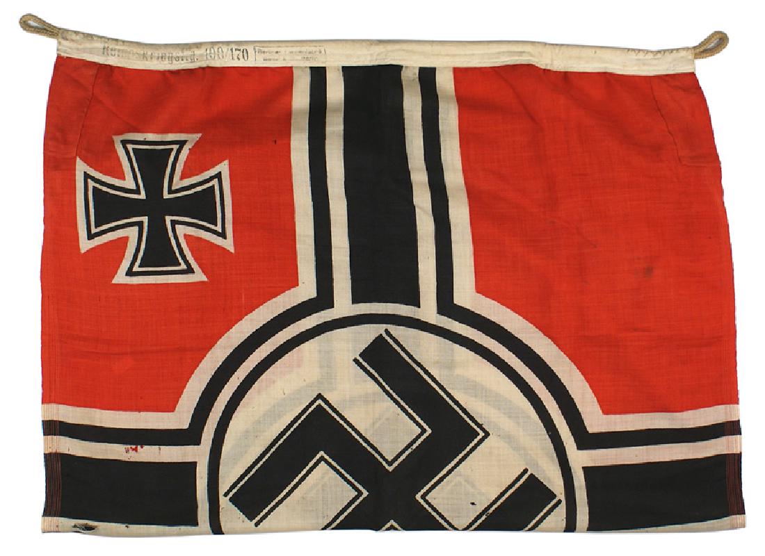 German WWII Navy Kriegsflagge: H-060 German WWII "Kriegsflagge". Black swastika within a white circle with white and black striped dissected panels - all on a red field. Black Iron Cross in upper left corner. Some scattered mothing