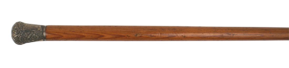 American presentation walking cane: H-171 American presentation walking cane. High relief carved floral designs on the silvered cane head. "Presented by General St. Claire Mulholland - Chief of Police of the City of Philada. to Joseph S