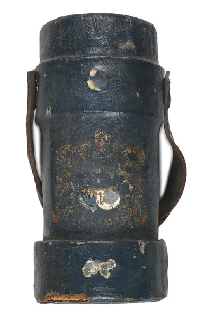Antique British fire bucket Circa 1890: H-185 Antique British fire bucket. 13" tall waterproofed cloth covered wood cylinder. Two 3" bands, one holding a swivel leather handle. Green colored fabric body shows traces of a large British Natio