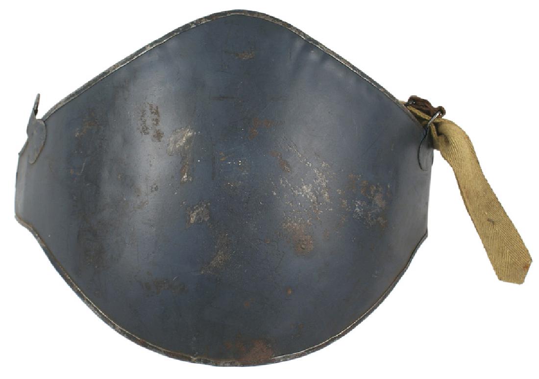 French WWI Adrian Abdominal Plate: H-189 French "Cuirasse Abdominale" - WWI Adrian Abdominal Plate. Also referred to as the Adrian Assault Cuirass. 3rd type adopted after field trials in 1916. A convex 10" x 13 1/2" curved steel plate 