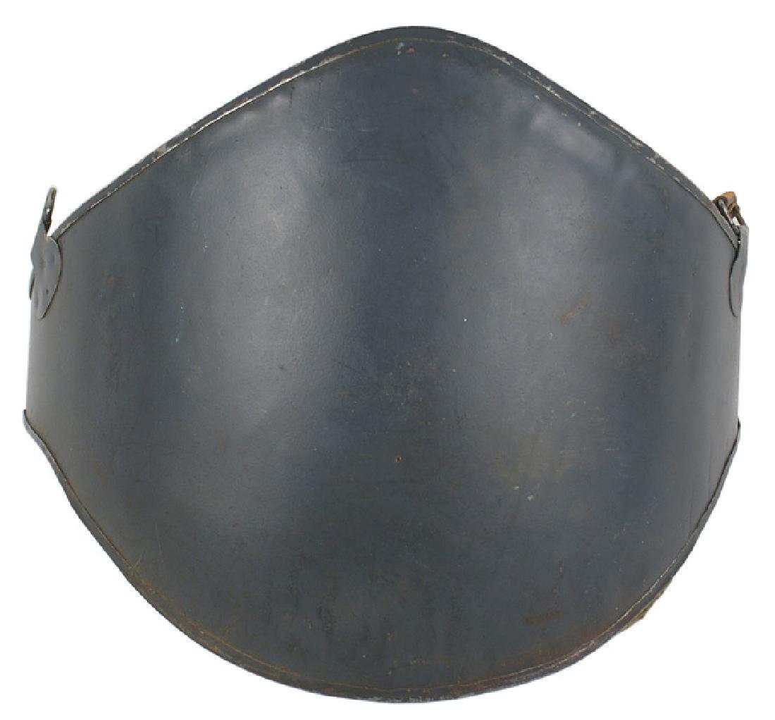 French WWI Adrian Abdominal Plate: H-190 French "Cuirasse Abdominale" - WWI Adrian Abdominal Plate. Also referred to as the Adrian Assault Cuirass. 3rd type adopted after field trials in 1916. A convex 10" x 12 1/4" curved steel plate 