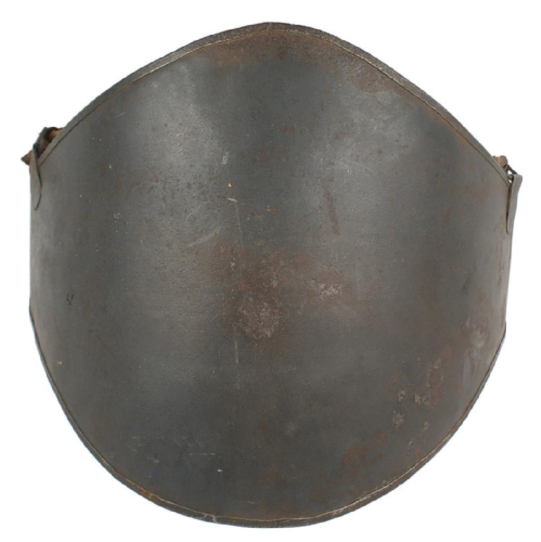 French WWI Adrian Abdominal Plate: H-191 French "Cuirasse Abdominale" - WWI Adrian Abdominal Plate. Also referred to as the Adrian Assault Cuirass. 3rd type adopted after field trials in 1916. A convex 10" x 12 1/2" curved steel plate 