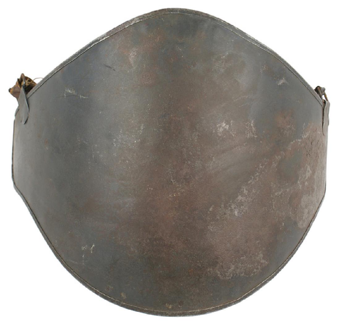French WWI Adrian Abdominal Plate: H-192 French "Cuirasse Abdominale" - WWI Adrian Abdominal Plate. Also referred to as the Adrian Assault Cuirass. 3rd type adopted after field trials in 1916. A convex 10 3/4" x 13 1/4" curved steel pl