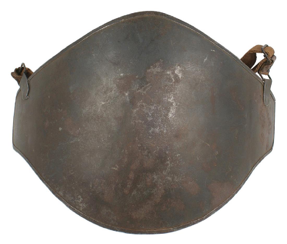 French WWI Adrian Abdominal Plate: H-193 French "Cuirasse Abdominale" - WWI Adrian Abdominal Plate. Also referred to as the Adrian Assault Cuirass. 3rd type adopted after field trials in 1916. A convex 10 1/2" x 15" curved steel plate 