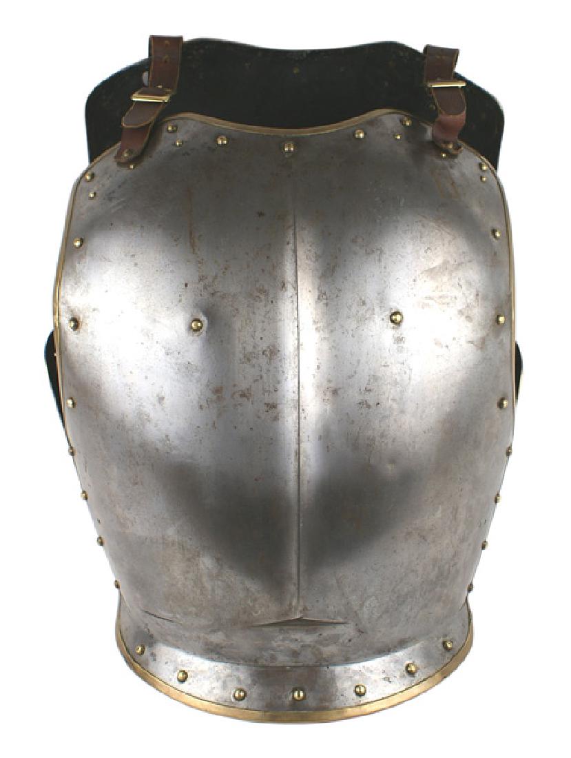 British Cavalry dress cuirass armor: R-010 British cavalry possibly 1st Lifeguards, dress cuirass armor. Steel frontplate is brass trimed and has an inner border consisting of 34 domed brass rivets. A high ridge runs down the center to a