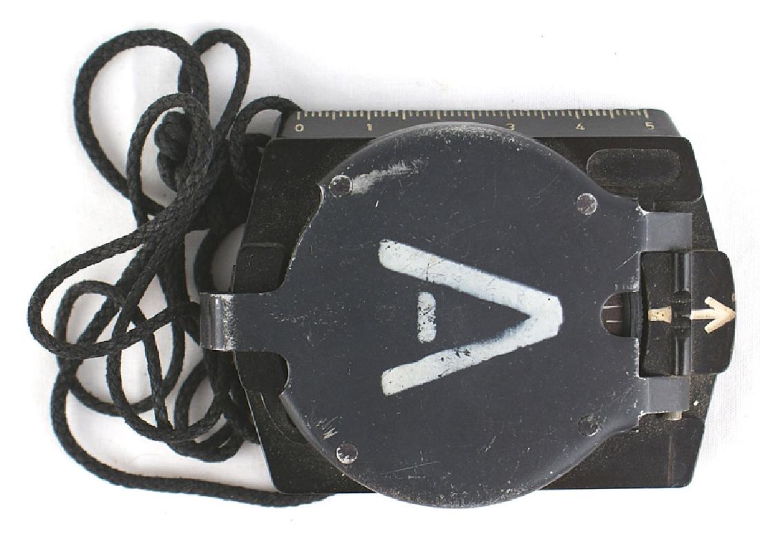 German WWII Army compass: N-012 German WWII Army compass. Bakelite body with a folding metal lid. With original neck cord. II+