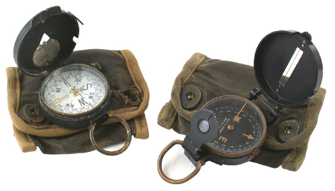 Lot of 2 U.S. WWII lensatic compasses: N-066 Lot of 2 U.S. WWII lensatic compasses. One is marked "U.S. ENGINEER CORPS". Both are in very good condition. Each has a canvas pouch, one with a belt hook, the other with a belt loop. Pouches sh