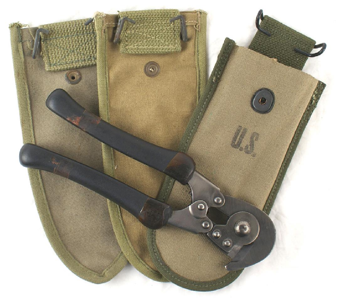 U.S. WWII Marine Corps M1938 wire cutters: N-102 U.S. WWII Marine Corps M1938 wire cutters. Marked "U.S. - W.S. CO. - 1945". Type with the enlargened head. OD pouch is marked "U.S.". Made by "SCHELL LEA. - GDS. CO., INC. - 1944". Also with two