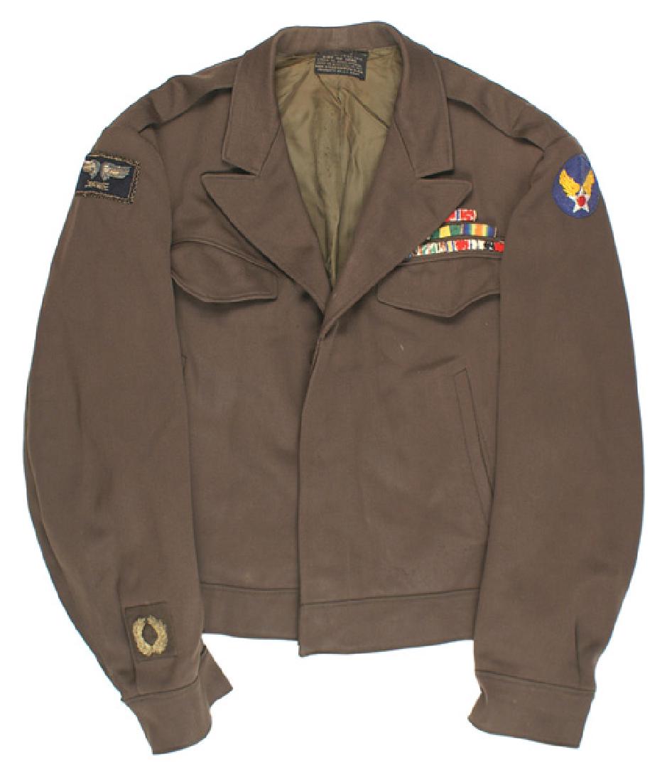 U.S. Army Air WWII wool officer Ike jacket: F-073 U.S. Army Air WWII wool officer's "Ike" jacket. USAAF and embroidered Mediterranean Allied Air Force (shows wear) shoulder insignia. Three rows of sewn-on ribbons (Legion of Honor, Bronze Star, 
