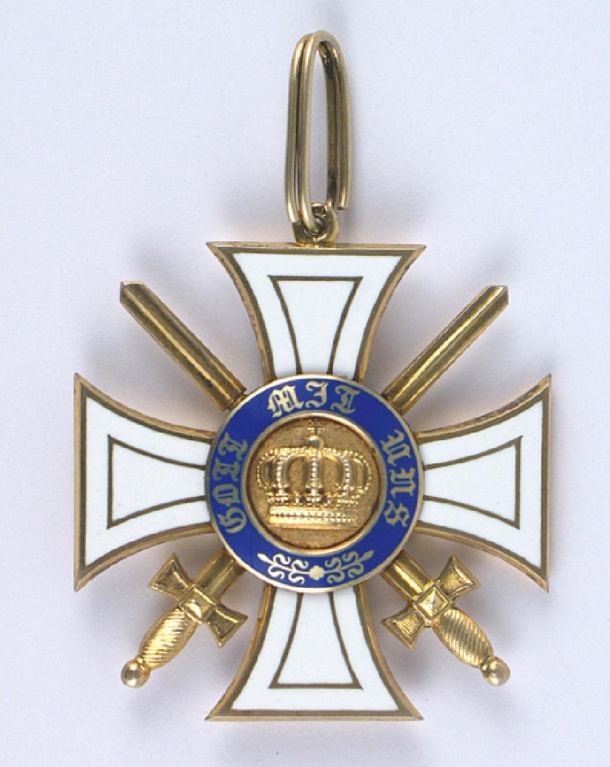 German Prussia Order the Crown medal: B-042 Imperial German Prussia. Order of the Crown, Commander with Swords. Silver gilded badge shows light wear/age with no damage or chips to enamel. Cross features multi-piece construction. Without r